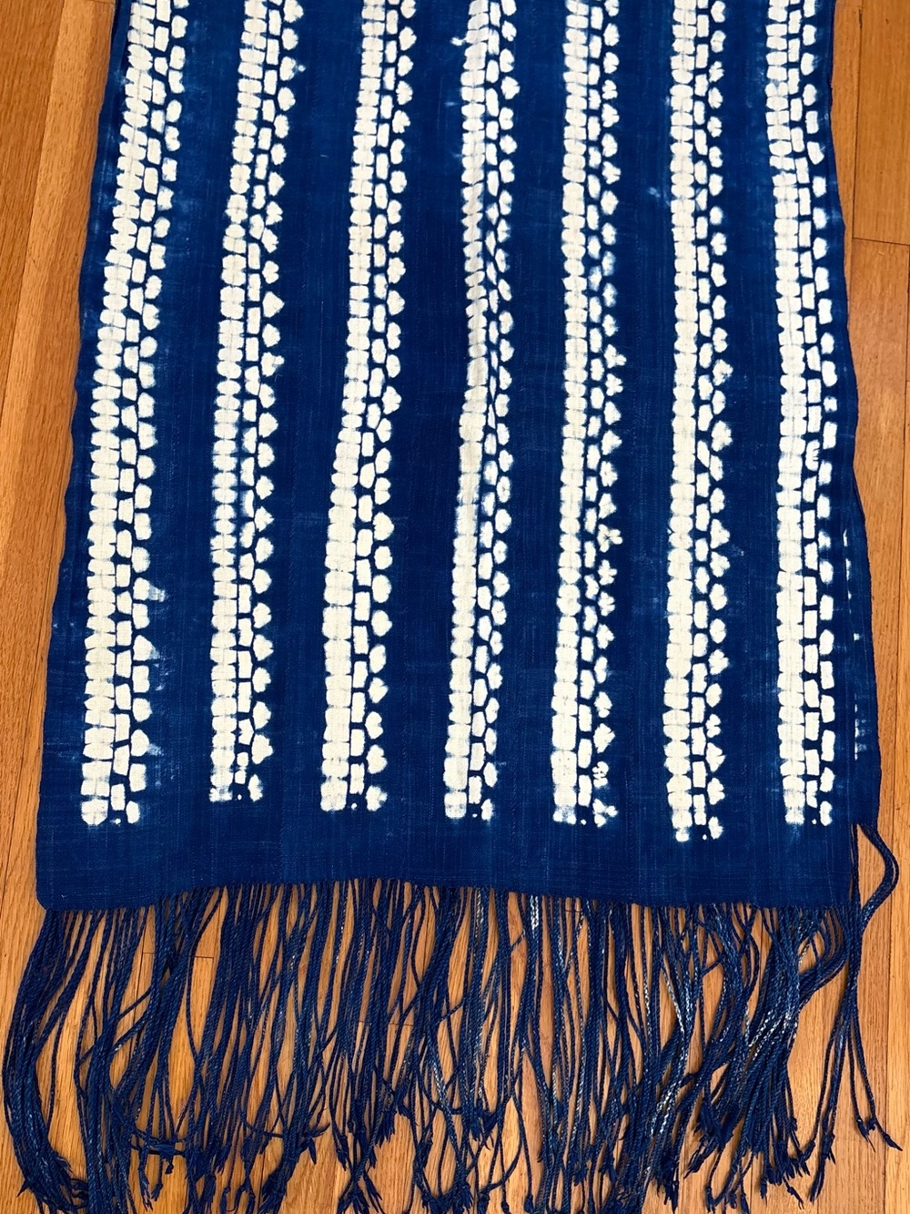 Handwoven Indigo Shibori mudcloth fabric with fringes.
